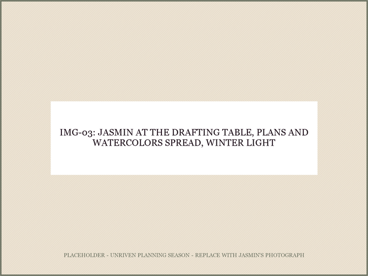 IMG-03: Jasmin at the drafting/kitchen table, plans and watercolors spread, winter light
